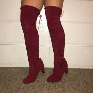 Red knee high boots
